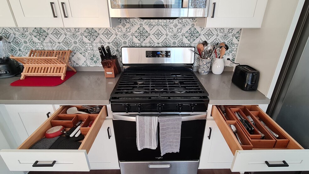 All your dining and cooking essentials are cleaned and sanitized for your stay. - 721 E 22nd St