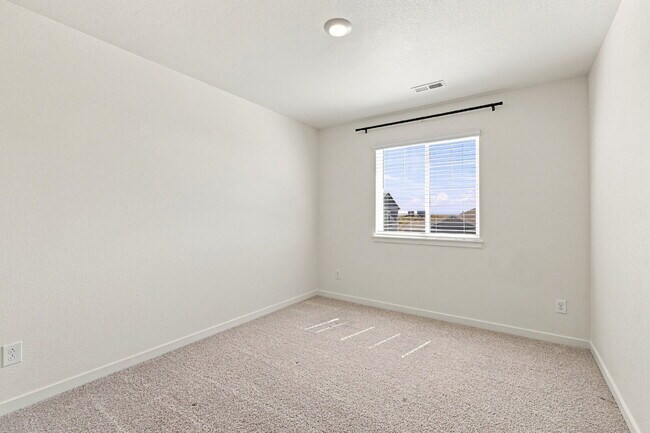 Building Photo - Spacious 4 Bedroom, 2.5 Baths in Bennett! 3 Car Attached Garage. Corner Lot!