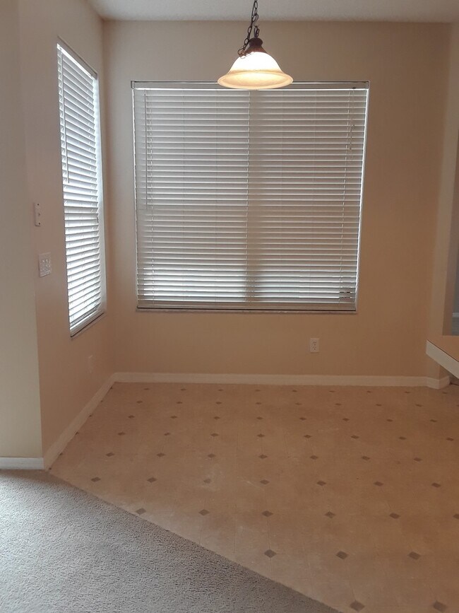 Building Photo - Spacious 4-Bedroom Pool Home with 3-Car Ga...