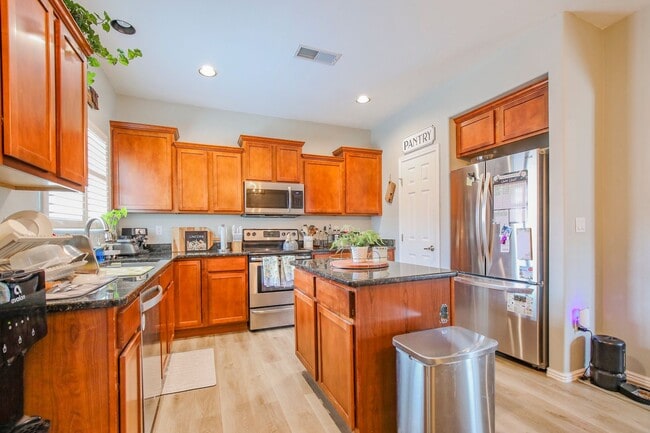 Building Photo - Well Maintained 4 Bedroom 2 Bath Home with...