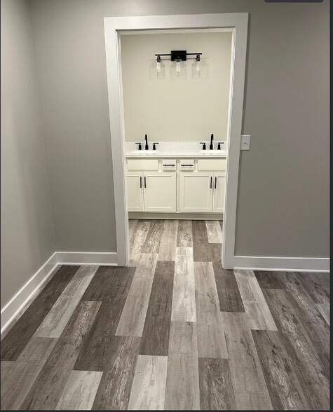 Master bath vanity W.I.C. to left bath to right - 8195 Lake Pleasant Rd