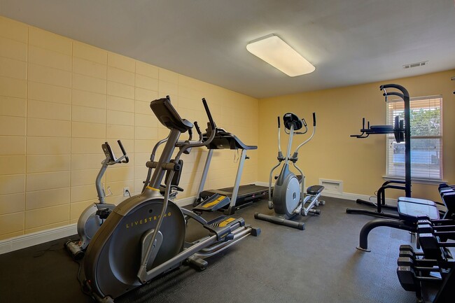 Building Photo - Welcome to Coastal Living at Harbor Landing Condominiums!