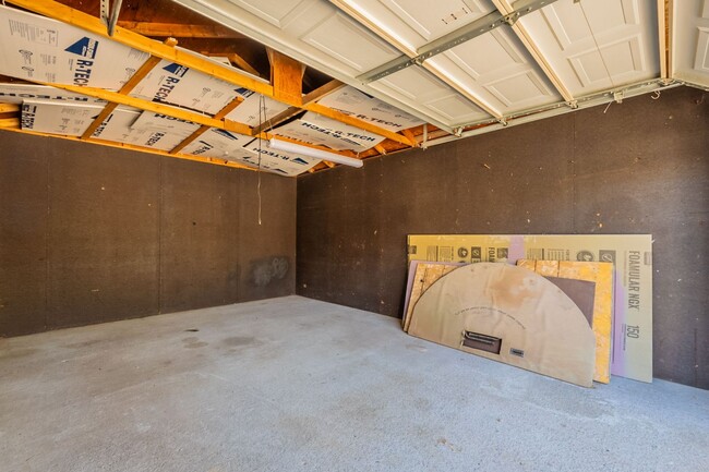 Building Photo - Three bedrooms plus big garage!