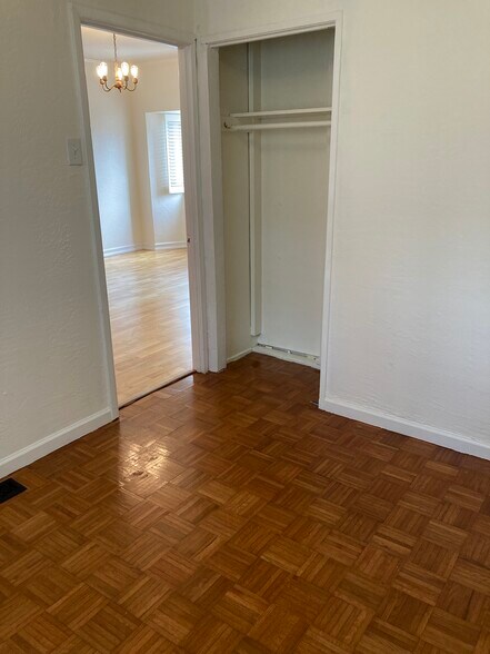 west bedroom + closet, looking out into living room - 436 Anderson St
