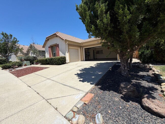 Building Photo - Spacious 4-Bedroom Elk Grove Home with Updated Kitchen, Quartz Countertops! VIEW TODAY!