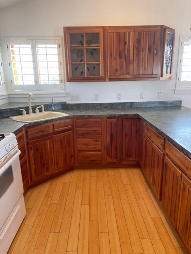 Building Photo - Privacy and Space in this Adorable Studio ...