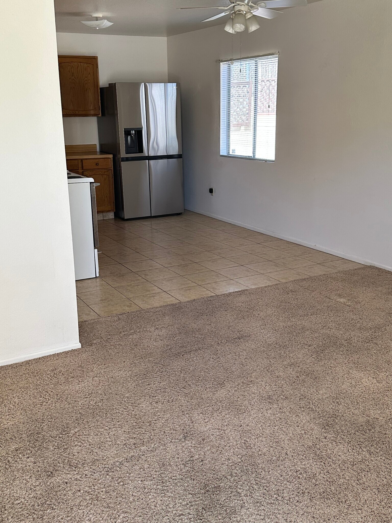 Living room to have new Matte Finished Porcelain floor 8/19/25. - 862 Del Rey Dr