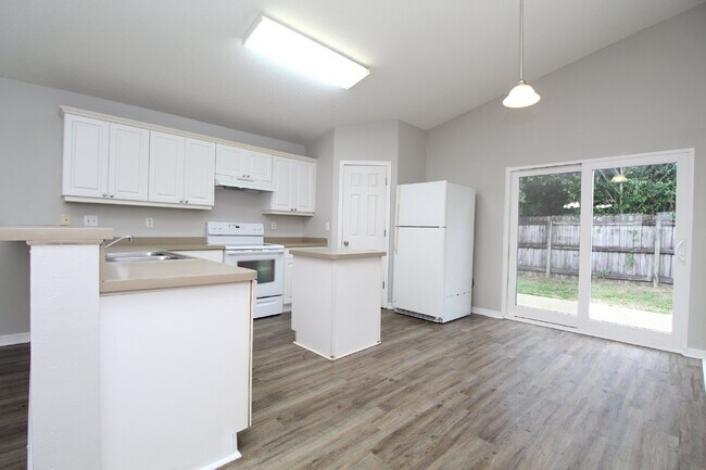 Building Photo - Coming Soon 4/20 – 3BR/2BA Home with 2-Car Garage, Open Layout, Island Kitchen, Split Floor Plan ...