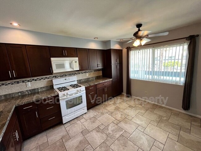 Building Photo - 1950 S Palm Canyon Dr