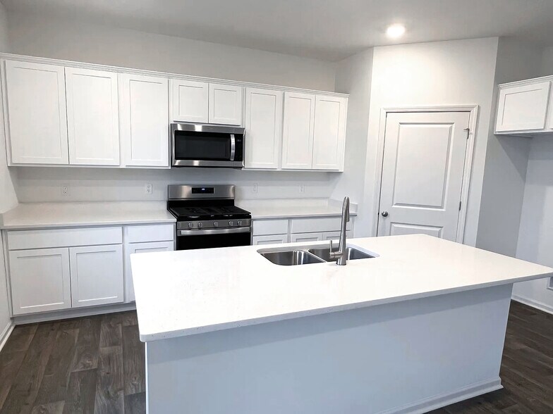 Kitchen comes with all appliances and large walk-in pantry - 7882 W 105th Pl