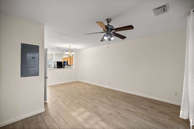 Building Photo - 2BR Townhome in Wynchase | Dual Suites + Screened Lanai
