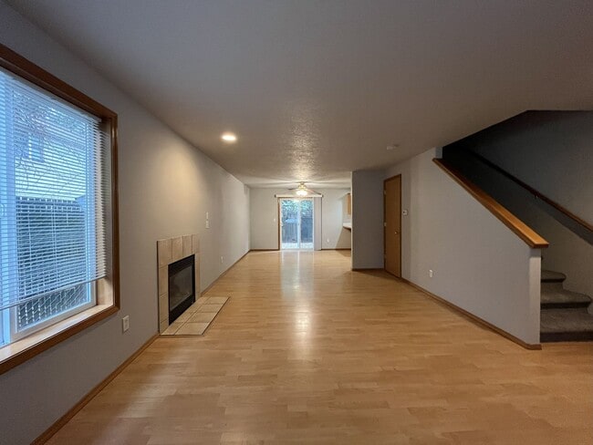 Building Photo - 3-Bed Home with Fireplace, Fenced Backyard, 2 Car Garage & Front Patio!