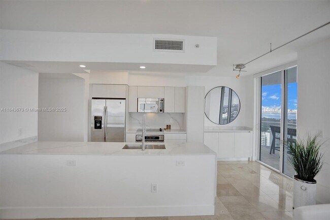 Building Photo - 6365 Collins Ave