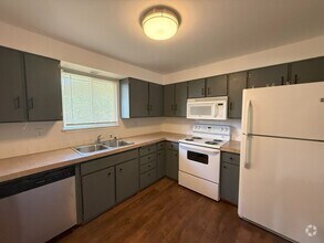 Building Photo - Cozy 4BR Home with Extra Space & Outdoor C...