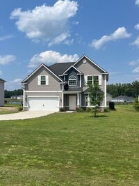 Building Photo - Spacious 4-Bedroom Pet Friendly Home with a Serene View - Available for Rent!