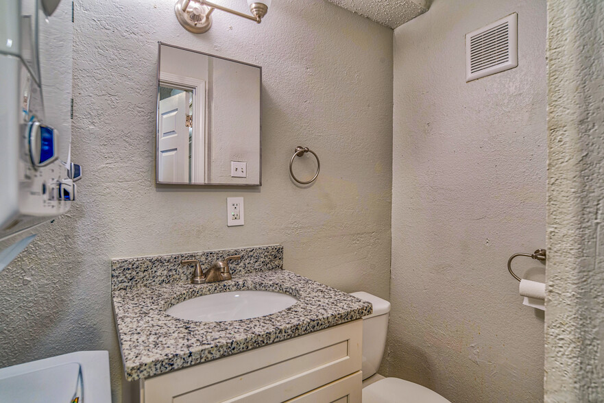 Granite counters in bathrooms - Towne West Manor