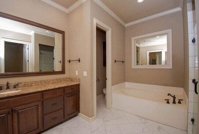 Building Photo - Rare lease opportunity in the exclusive ga...