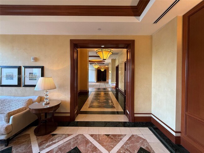 Building Photo - 20201 E Country Club Dr