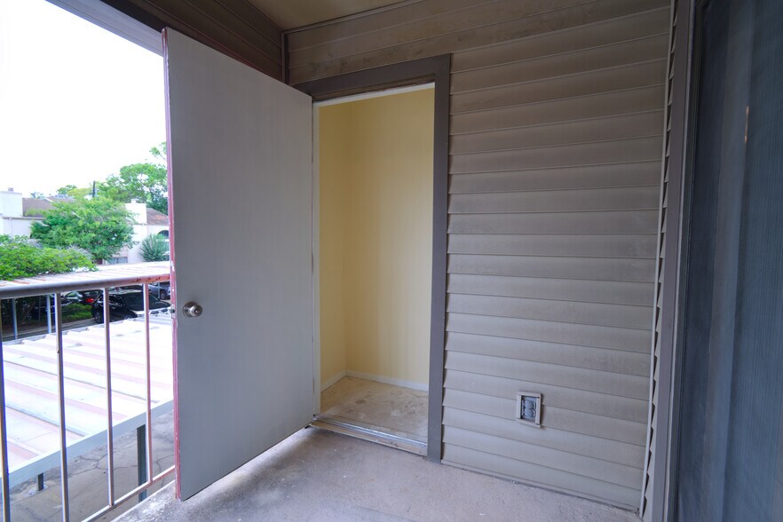 Balcony, with the storage room visible. - 2025 Augusta Dr