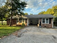 Building Photo - 2 bed/ 1 bath duplex with Carport