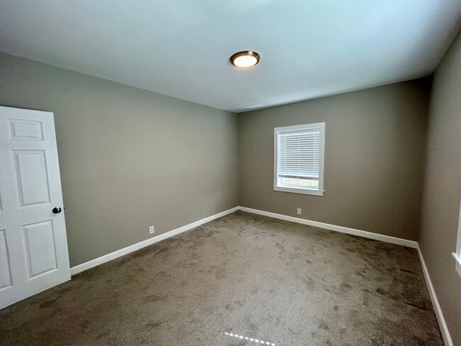 Building Photo - DELHI TWP- Spacious 4 bedroom 3 bath Cape Cod with garage