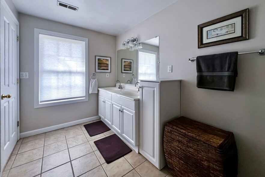 Master bathroom with double sink and tiled walk-in shower - 278 Harrison St