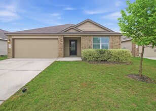 Building Photo - 4 Bedroom Home with Open Layout and Refrigerator Included