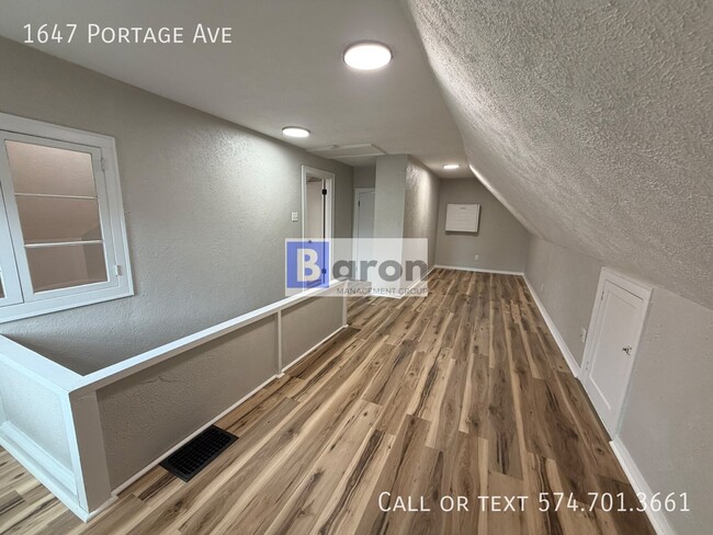 Building Photo - 1647 Portage Ave
