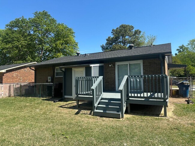Building Photo - Durham Gem with Fenced Yard & Deck