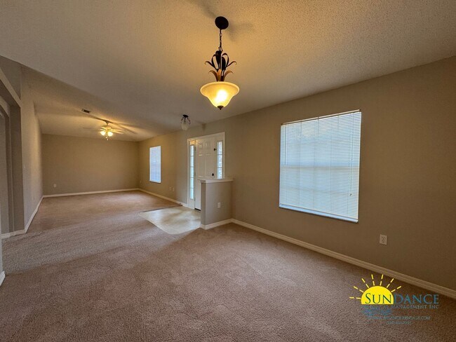 Building Photo - Fresh new look coming soon! Brand-new LVP flooring is being installed! Home in Holley by the Sea!!
