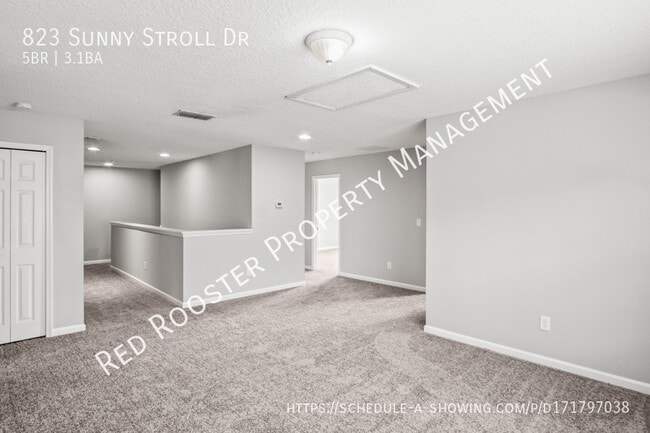 Building Photo - 823 Sunny Stroll Dr
