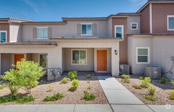 Building Photo - Modern townhome with open-concept layout