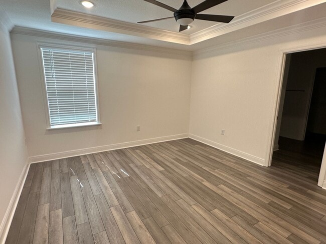 Building Photo - Nearly New 3 Bedroom Smart Home with Lawn Care Included!