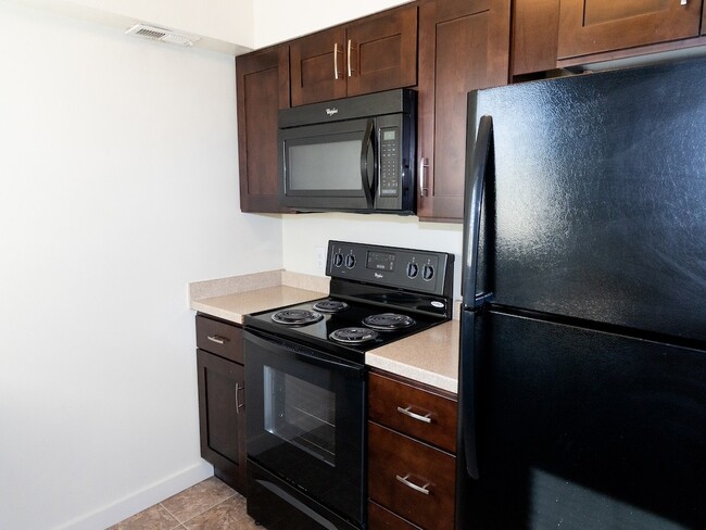 Updated Kitchen at Crossroads Apartments - Crossroads Apartments