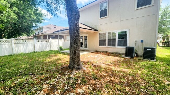 Building Photo - Spacious 4BR w/ Fenced Yard + Covered Lanai + 2 Car Garage  in Orange Park!