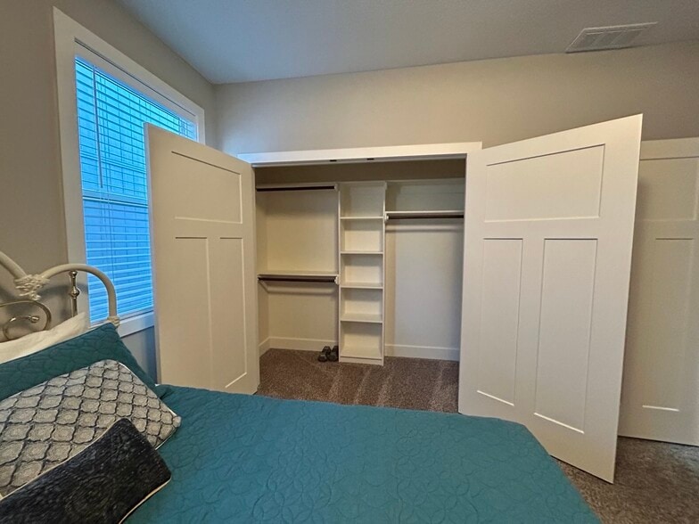 Second bedroom with oversized closet - 405 E 32nd Ave