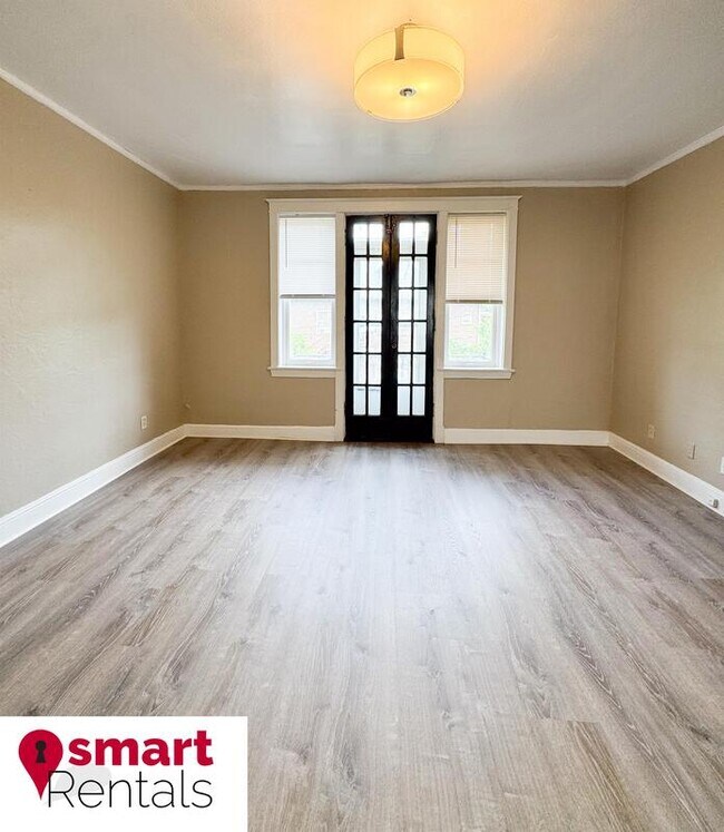 Building Photo - 7204 Zephyr Place - 2E