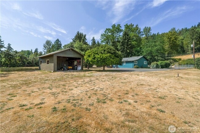 Building Photo - May Valley Road business opportunity available - 2 bedroom 1 bath home with carport & office and ...