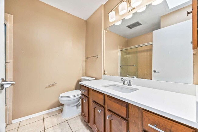 Building Photo - "Charming garden home offers 3-Bedroom Sanctuary with Cozy Fireplace in San Antonio – 1710 Sq Ft ...