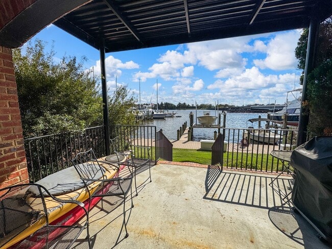 Building Photo - Fully Furnished Waterfront Elegance on Mai...