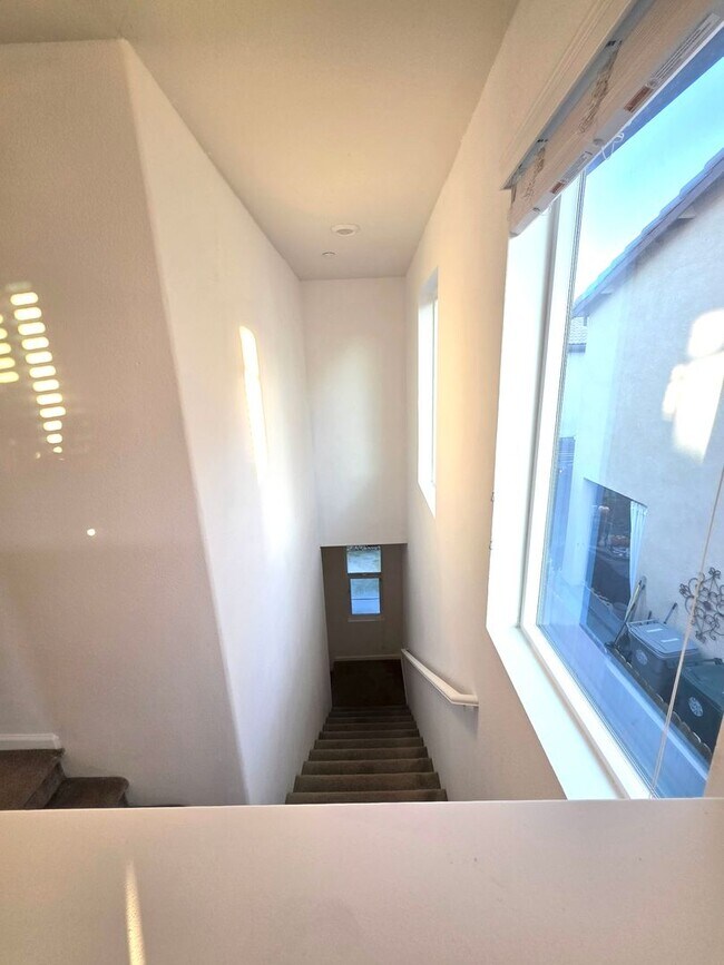 Building Photo - Spacious 5BR + Loft in Hamptons Village – Studio Suite, New HVAC, EV Charging