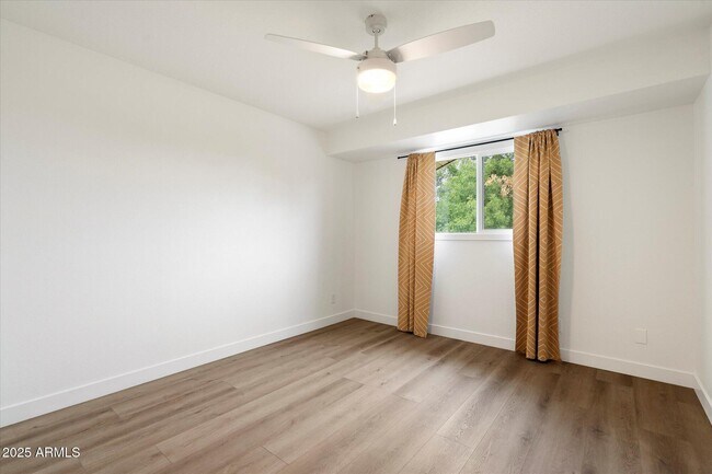 Building Photo - 8447 E Montebello Ave