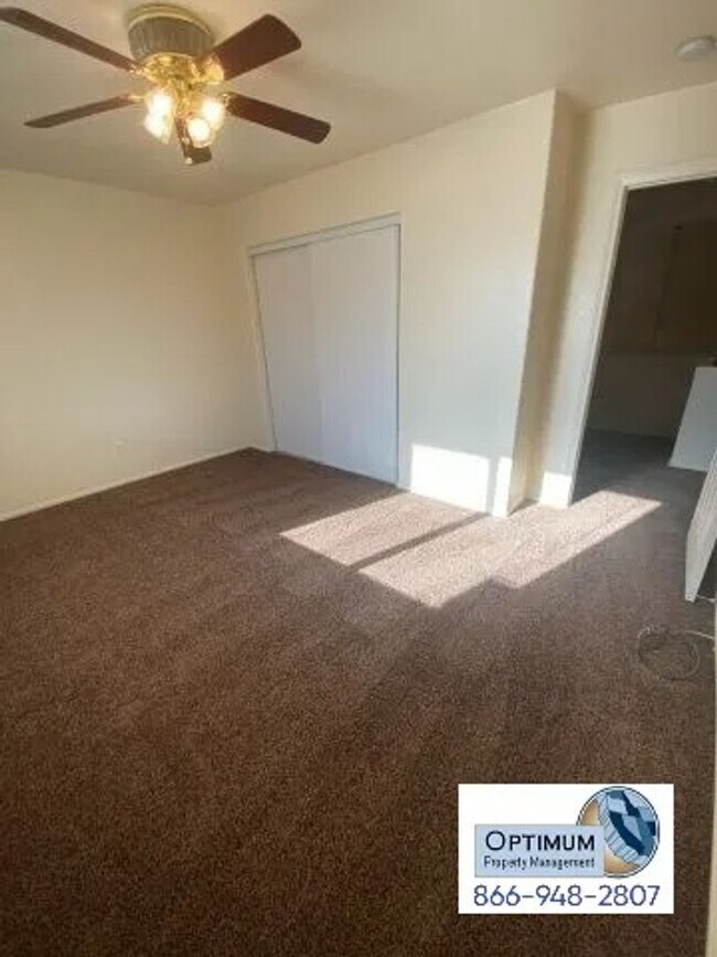 Building Photo - Spacious 4-Bedroom Home with 3-Car Garage & Downstairs Suite!