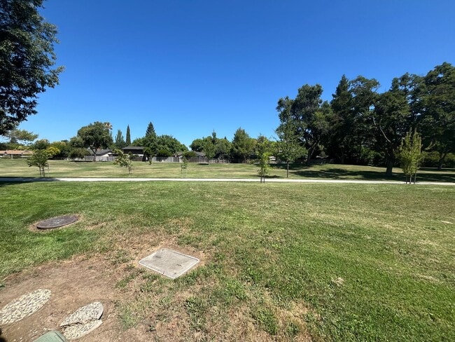 Building Photo - Charming 2-Story Condo on Greenbelt-$500 O...