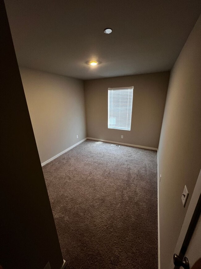 Building Photo - Spacious 4-Bedroom Townhome with Loft, Che...