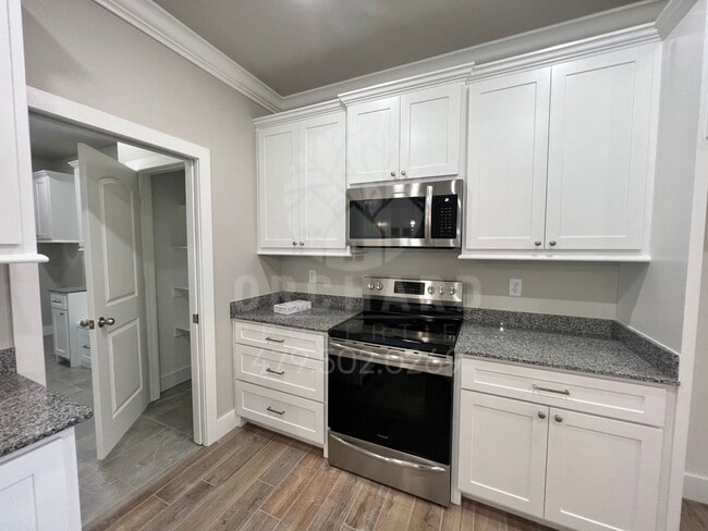 Building Photo - Single-Family Home- Bella Vista- Spacious ...