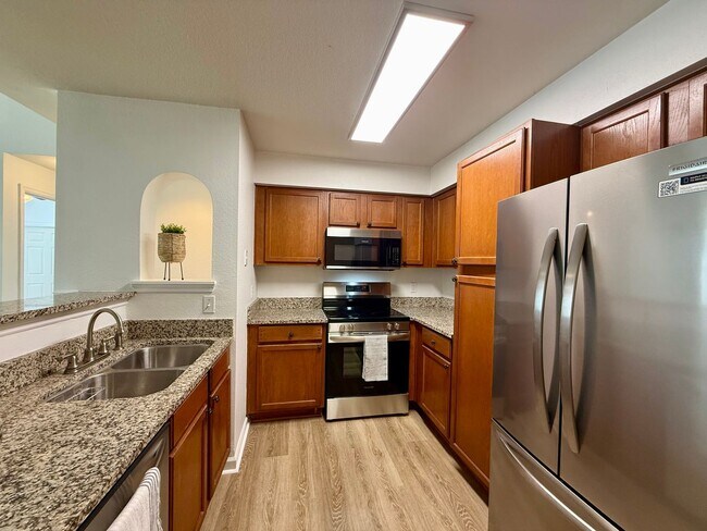 Building Photo - Bright and updated 3-bedroom, 2-bath condo