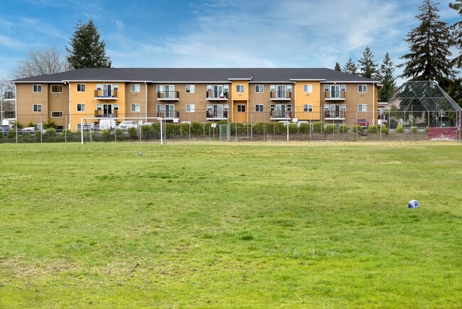 Building Photo - Refined Studio Living at Marigold Apartments — Available Now