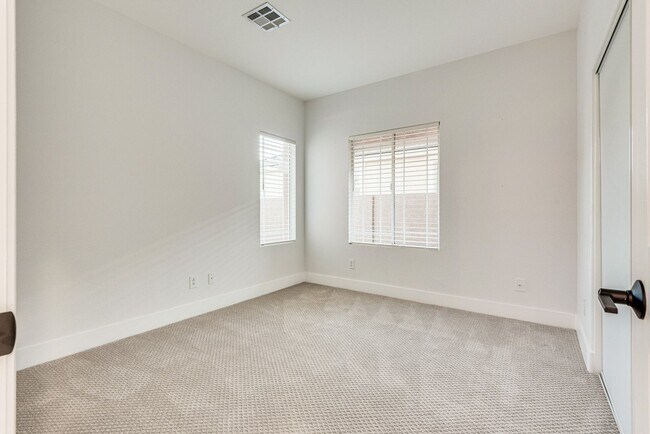 Building Photo - FULLY FURNISHED! Exudes sophistication with designer touches throughout