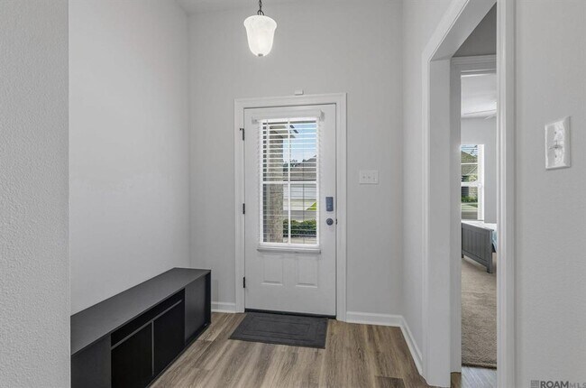 Building Photo - Modern 3 Bedroom Home with Private Backyard Views in Forestwood